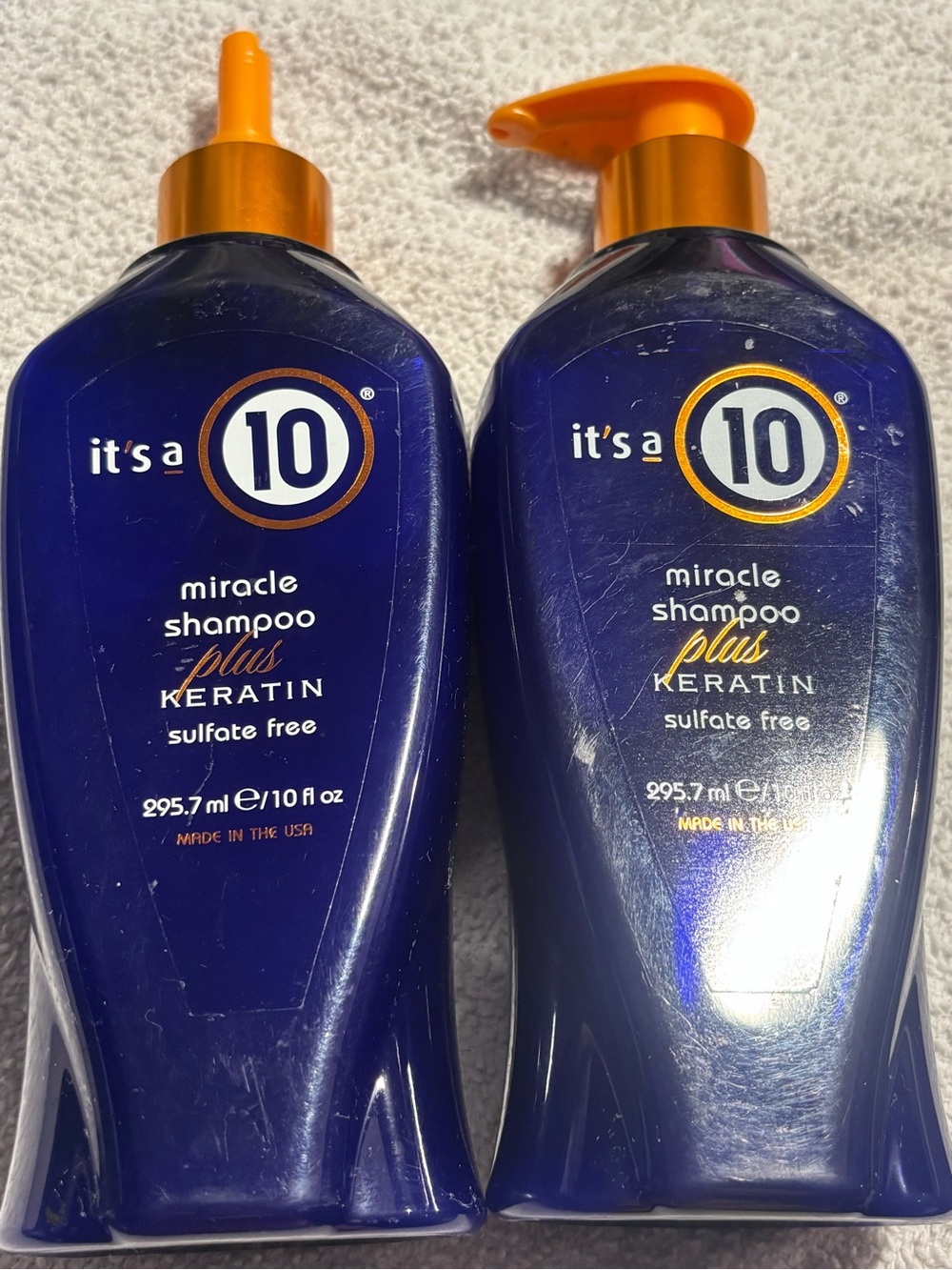 it's a 10 Miracle Shampoo Plus Keratin - Deep Blue Bottle with Orange Pump
